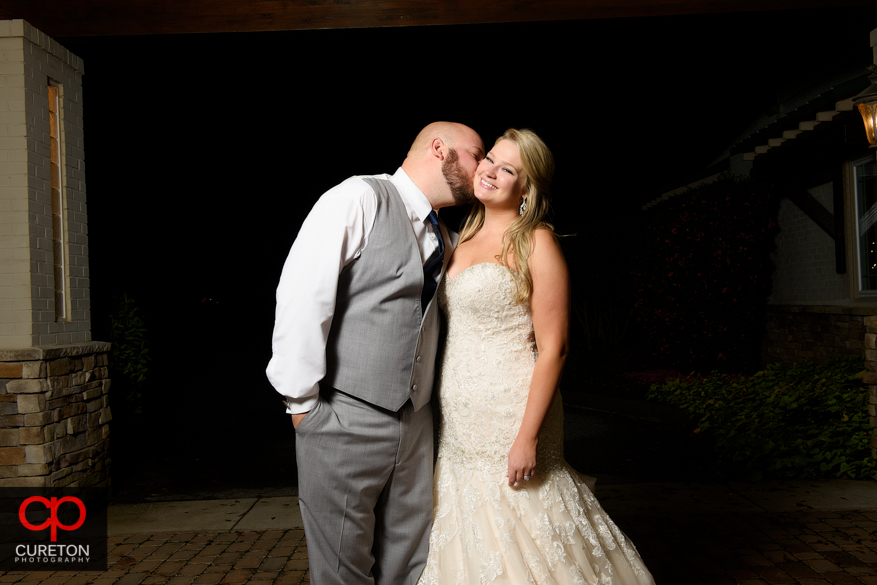 Married couple standing outside the sawmill.