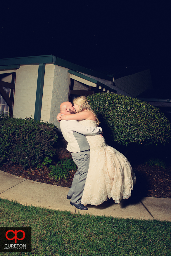 Couple after their Larkin's Sawmill wedding reception in Greenville,SC.