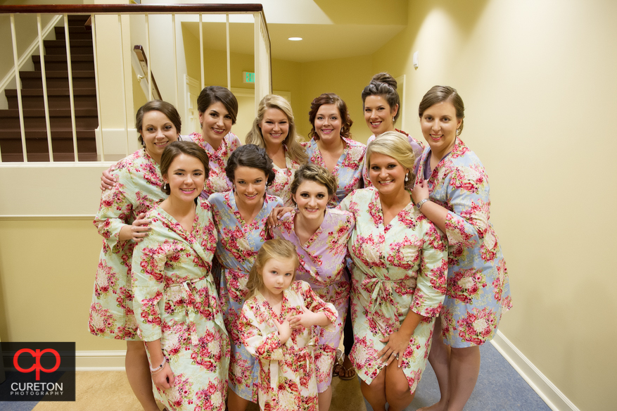 Bride and bridesmaids in their robes before the ceremony.