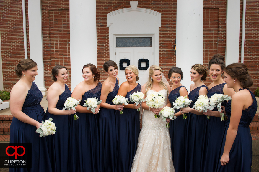 Bridesmaids in front of Berea First Baptist Church before the wedding.