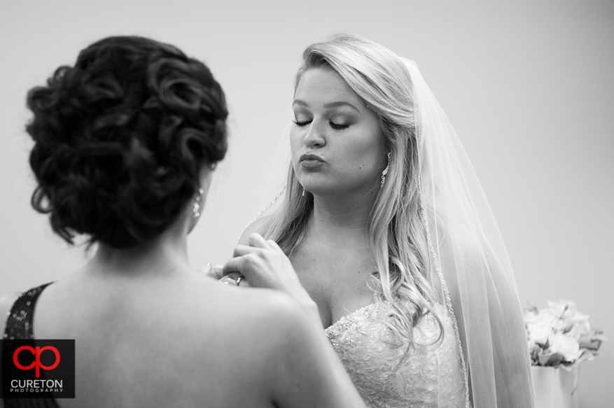 Bride taking selfies.