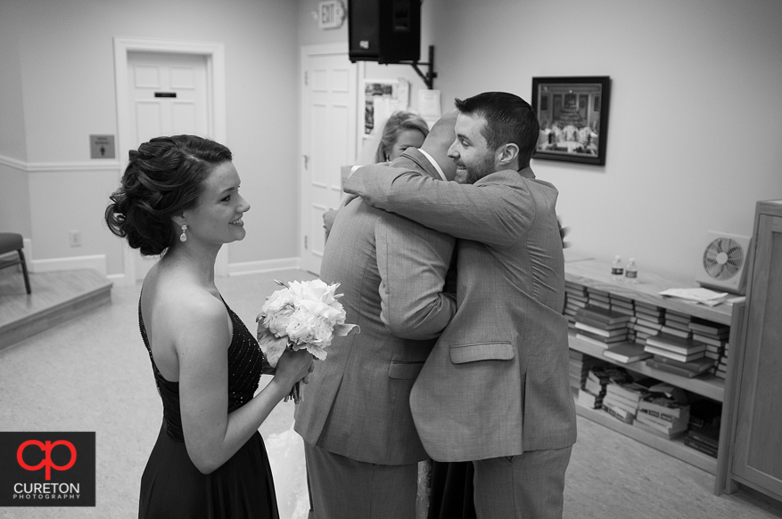 Couple congratulated after ceremony.