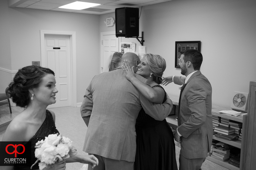 Couple congratulated after ceremony.