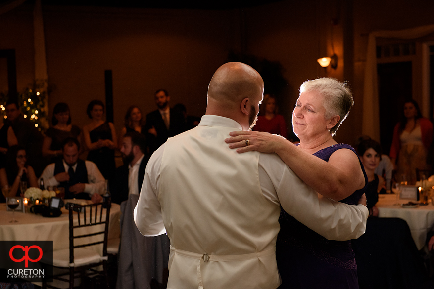 Groom dancing with his mother.