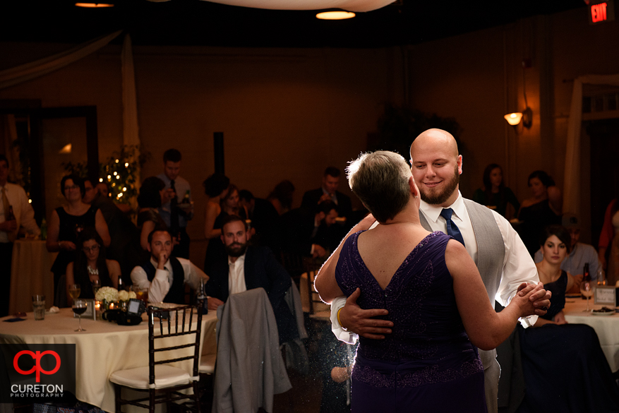 Groom dancing with his mother.