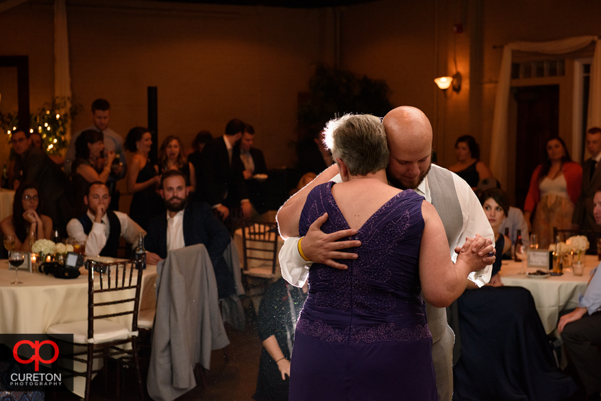 Groom dancing with his mother.