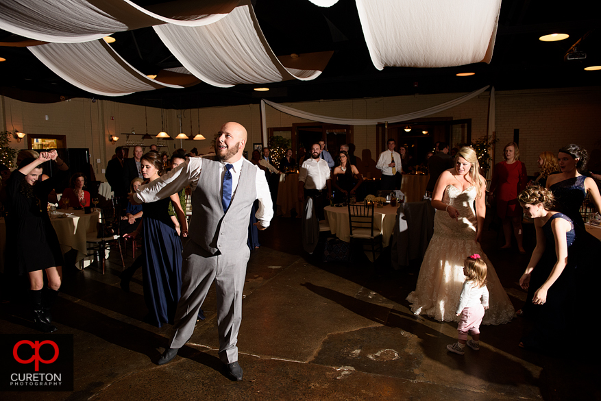 Groom doing the whip.