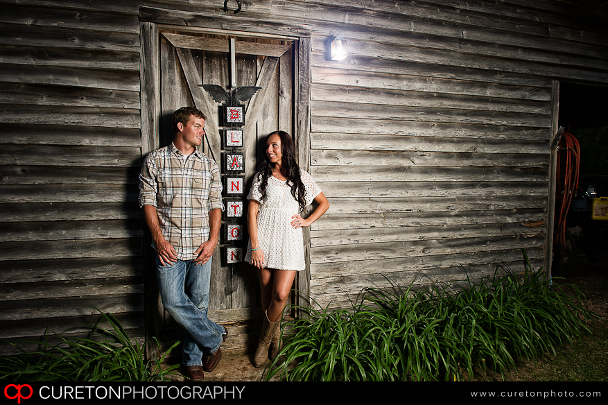 Engagement photo at a rustic barn.