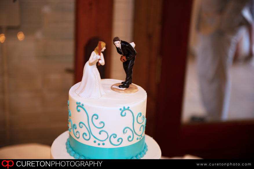 Baseball wedding cake topper.
