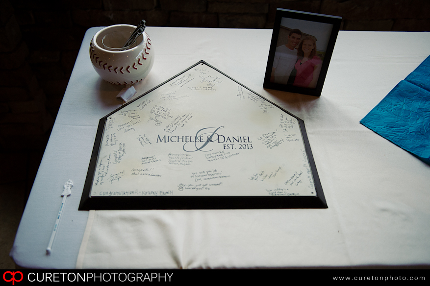 Baseball plate as a guestbook for wedding.