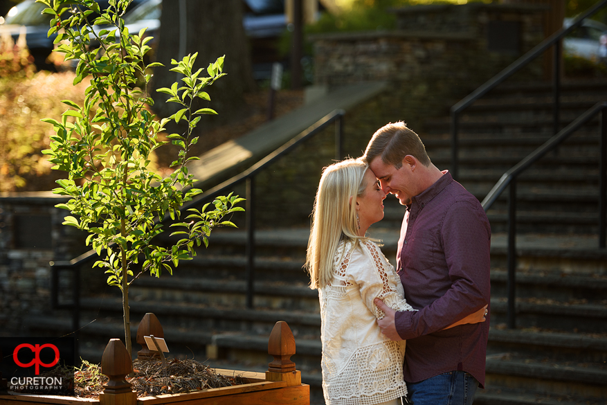 Couple touching foreheads.