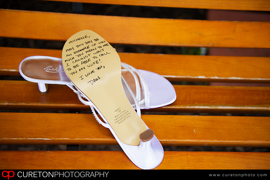 Bride with writing on shoes.