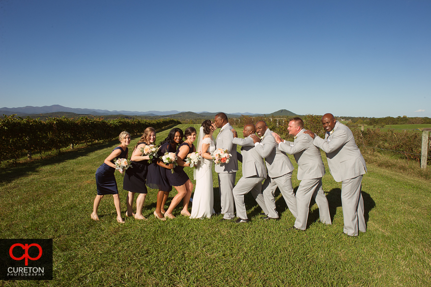Creative wedding party pose at Chattooga Belle Farm.