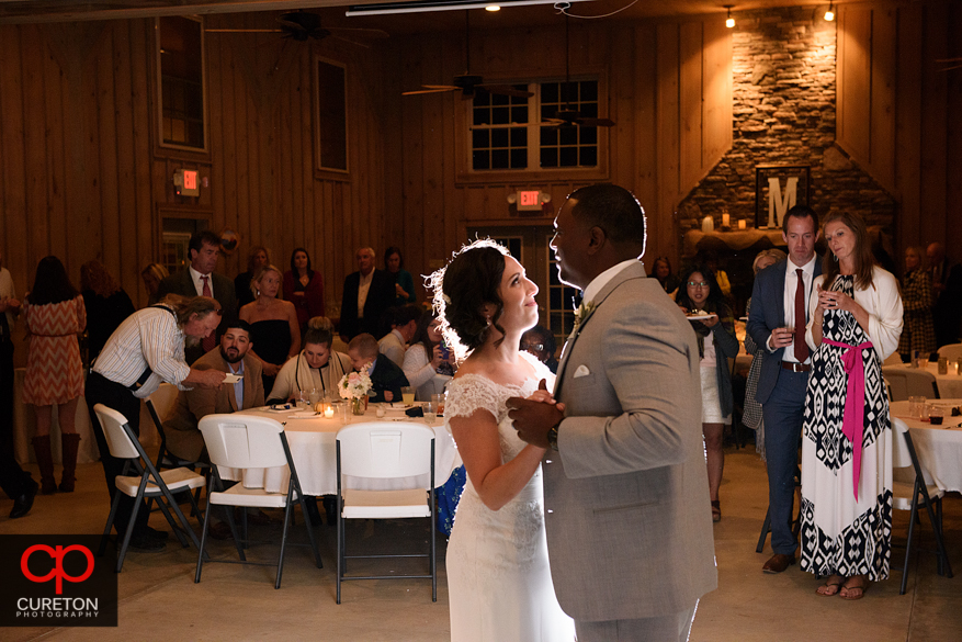 Bride and groom have their first dance.