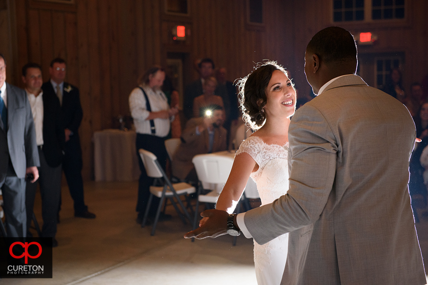 Bride and groom have their first dance.