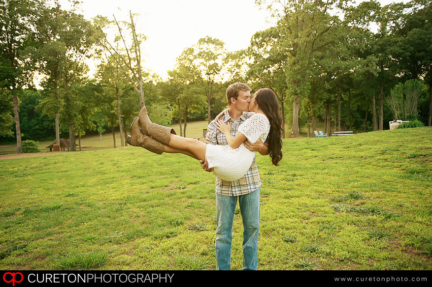 Groom holding bride at a farm in Chesnee,SC