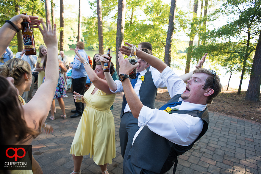 Guests dancing at the wedding reception at the Clemson outdoor lab.