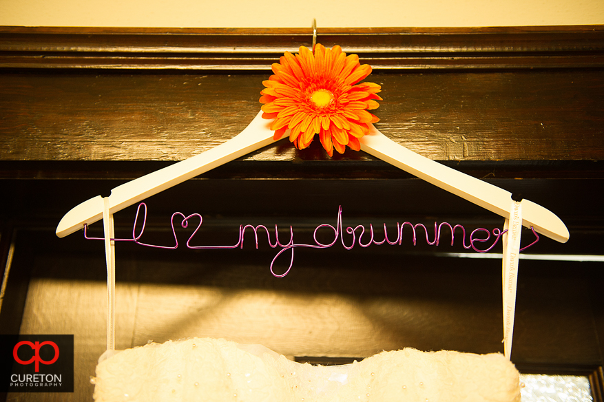 The bride's customized dress hanger.