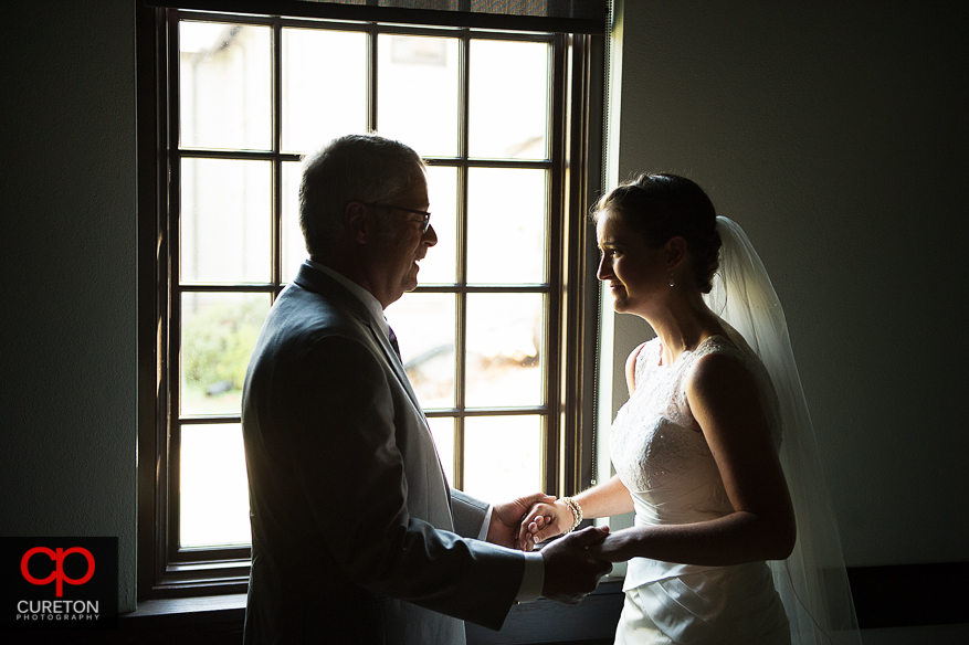 Bride's father sees her for the first time.