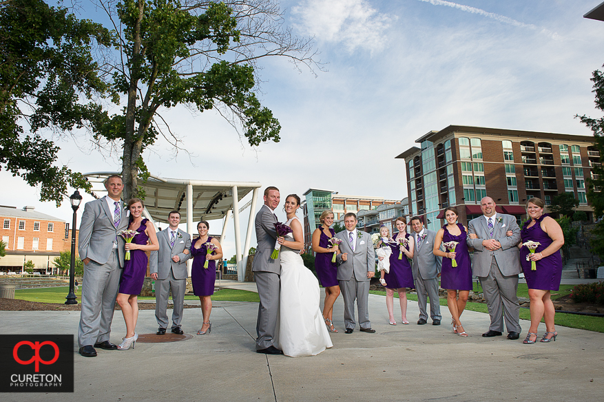 The wedding party posing very Vanity Fair style in downtown Greenville,SC.