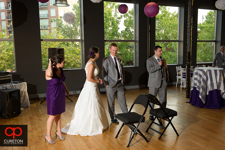 The best man giving a toast.