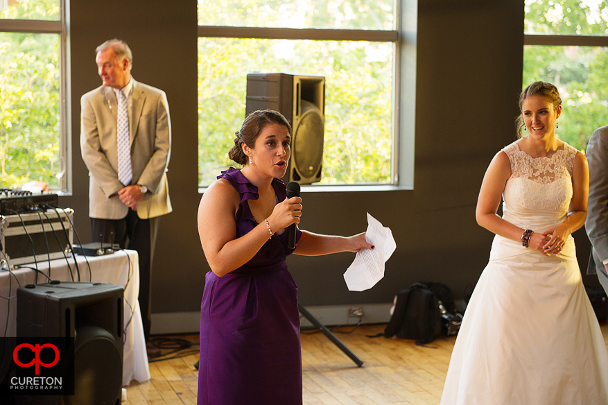 The maid of honor giving a toast.