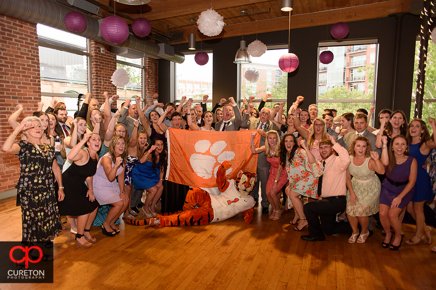 Wedding guest dance with the Clemson tiger.