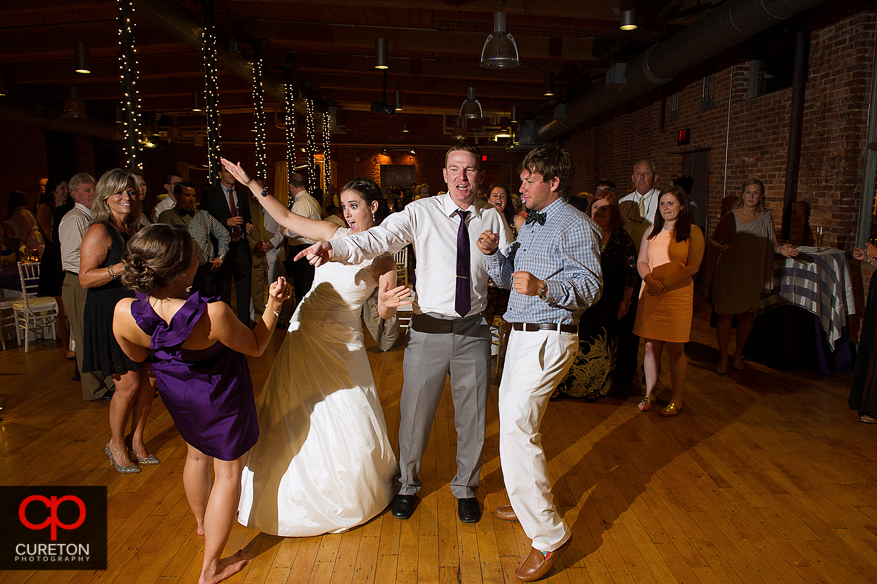 Wedding guest dance the night away at the Huguenot Loft in Greenville,SC.