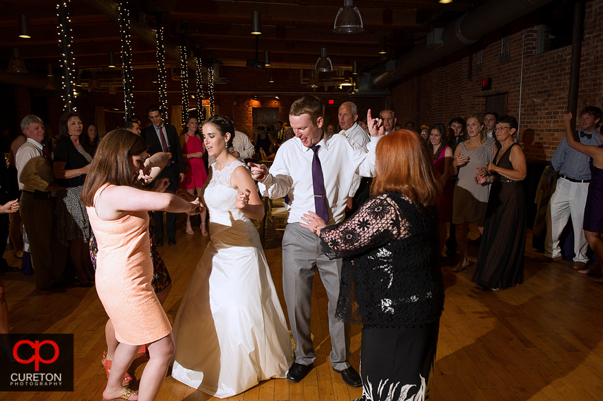 Wedding guest dance the night away at the Huguenot Loft in Greenville,SC.