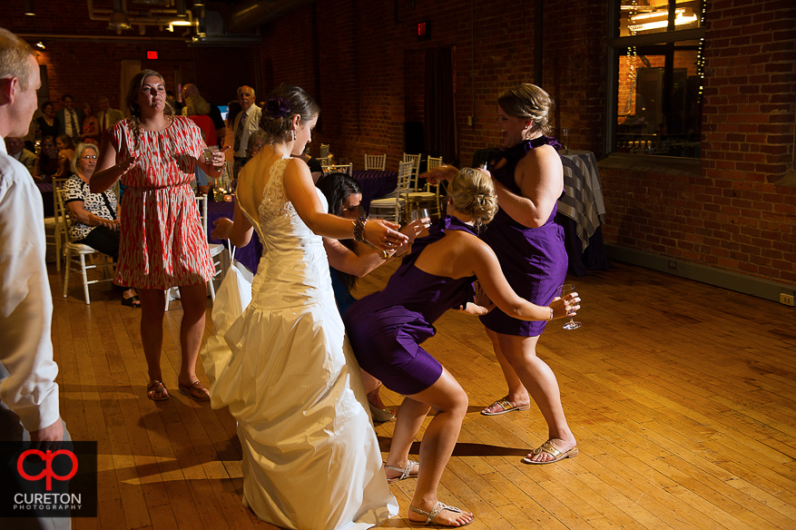 Wedding guest dance the night away at the Huguenot Loft in Greenville,SC.