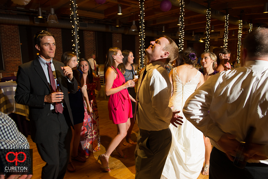 Wedding guest dance the night away at the Huguenot Loft in Greenville,SC.