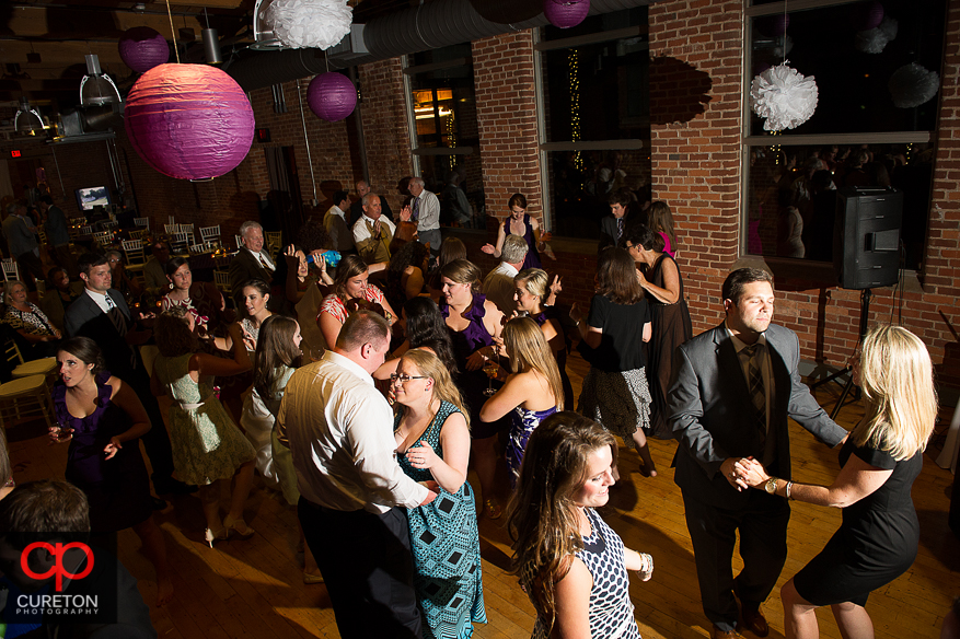 Wedding guest dance the night away at the Huguenot Loft in Greenville,SC.