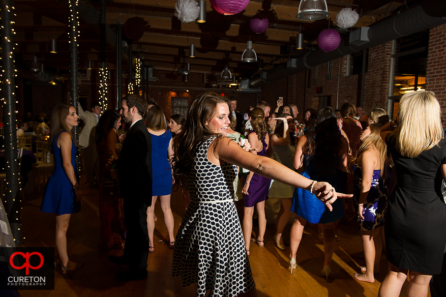 Wedding guest dance the night away at the Huguenot Loft in Greenville,SC.