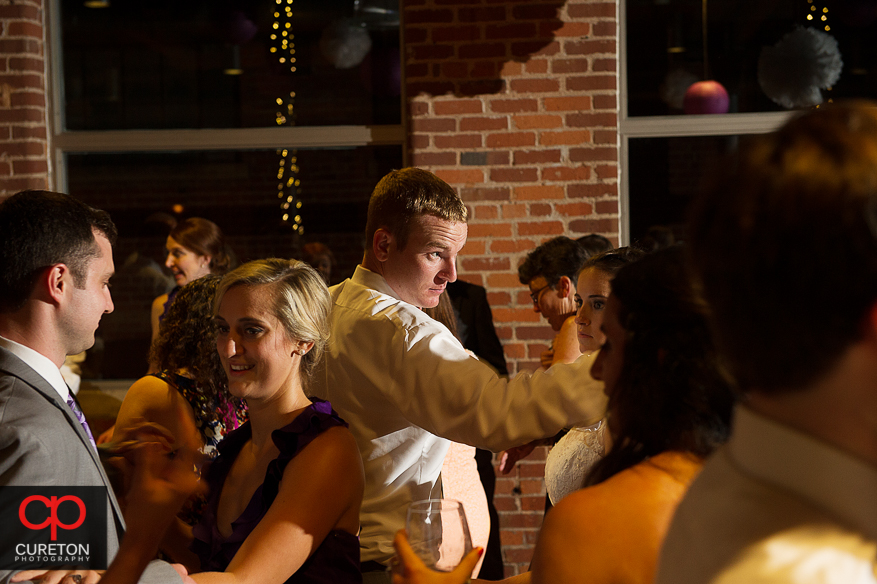 Wedding guest dance the night away at the Huguenot Loft in Greenville,SC.