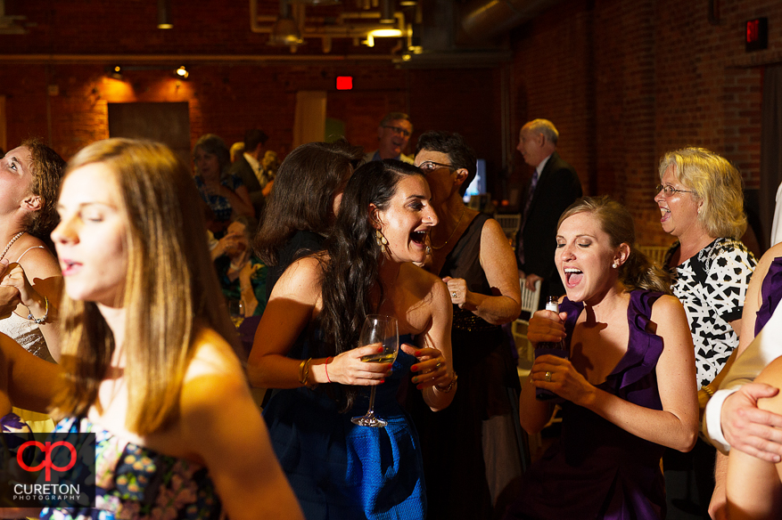 Wedding guest dance the night away at the Huguenot Loft in Greenville,SC.