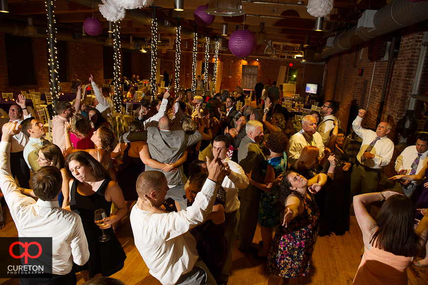 Wedding guest dance the night away at the Huguenot Loft in Greenville,SC.