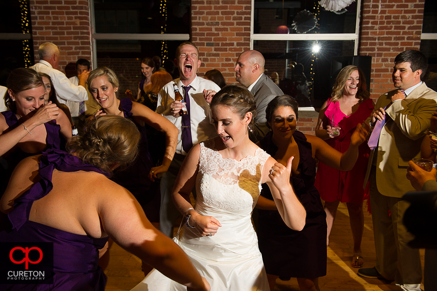 Wedding guest dance the night away at the Huguenot Loft in Greenville,SC.