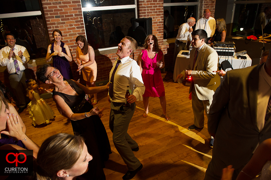 Wedding guest dance the night away at the Huguenot Loft in Greenville,SC.