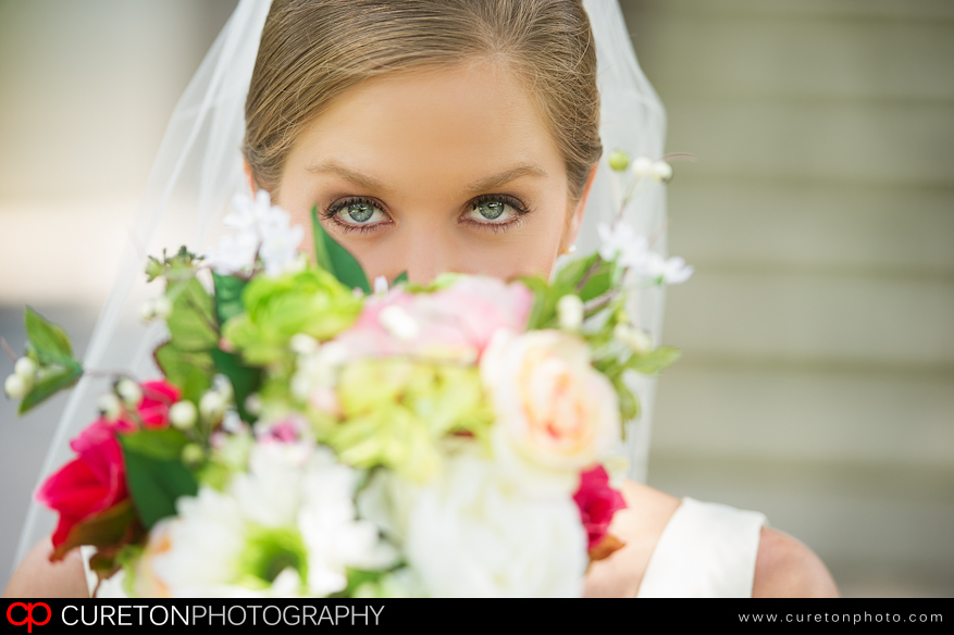 Bride holding flowers at The Robert Mills House in Columbia,SC.