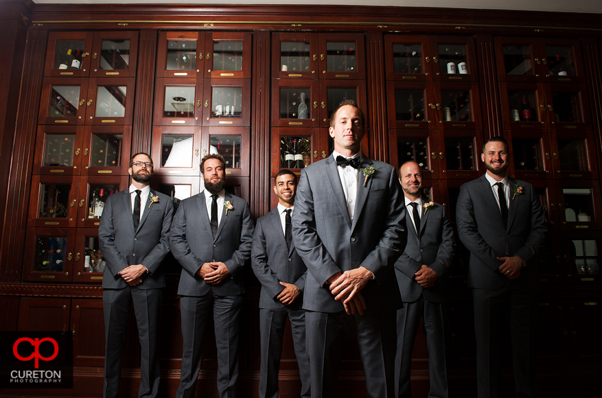 Groomsmen in the wine room at the Greenville Commerce Club.