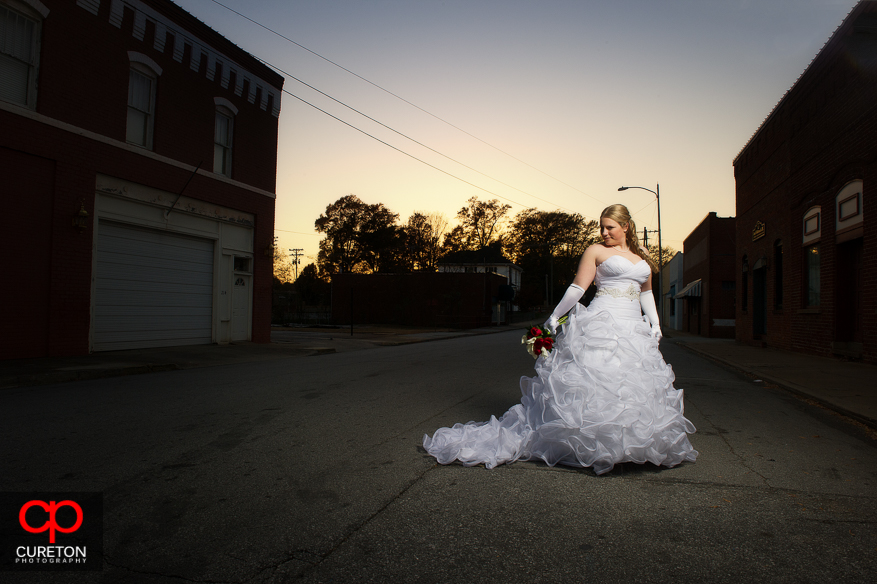 Bride at sunset in downtown Greer,SC.