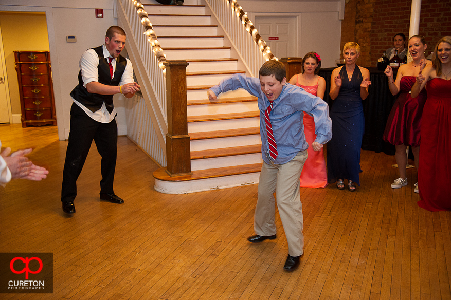 Wedding guests dancing.