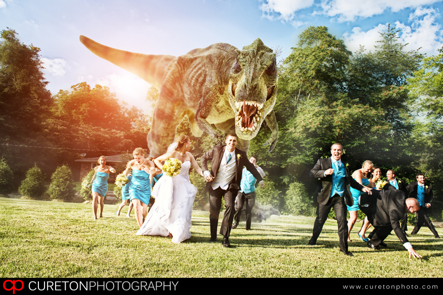 Dinosaur chasing wedding party outside the sawmill.