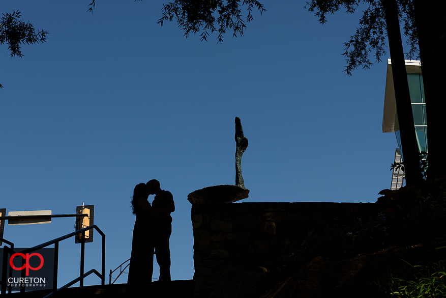 Silhouette of an engaged couple in Falls Park in downtown Greenville,SC.