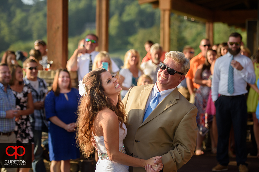 Bride dances with her father.