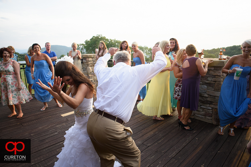 Guests dancing at the Grand Highlands at the Bearwallow Mountain wedding reception.