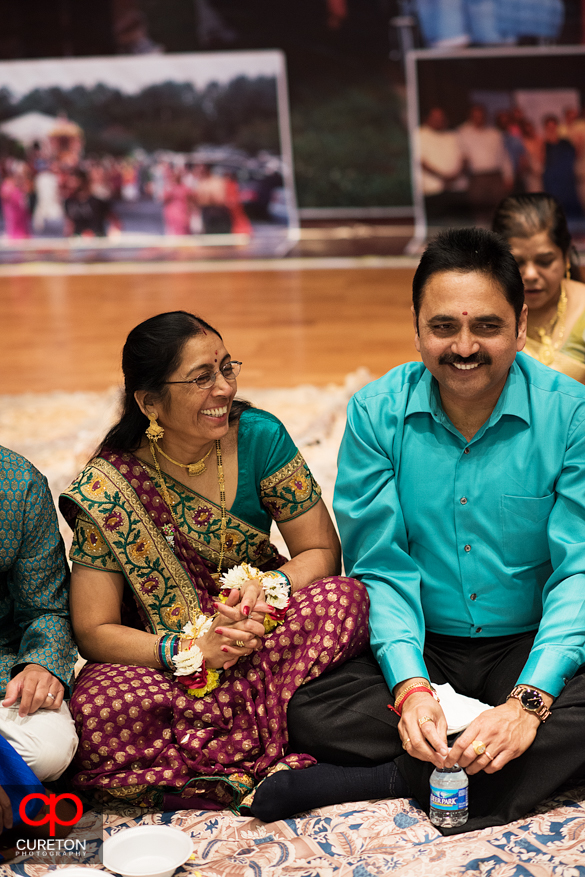 Indian couple smiling at the vidhi.
