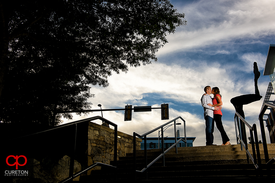 Couple kissing in Falls Park during a recent Greenville,SC engagement session.