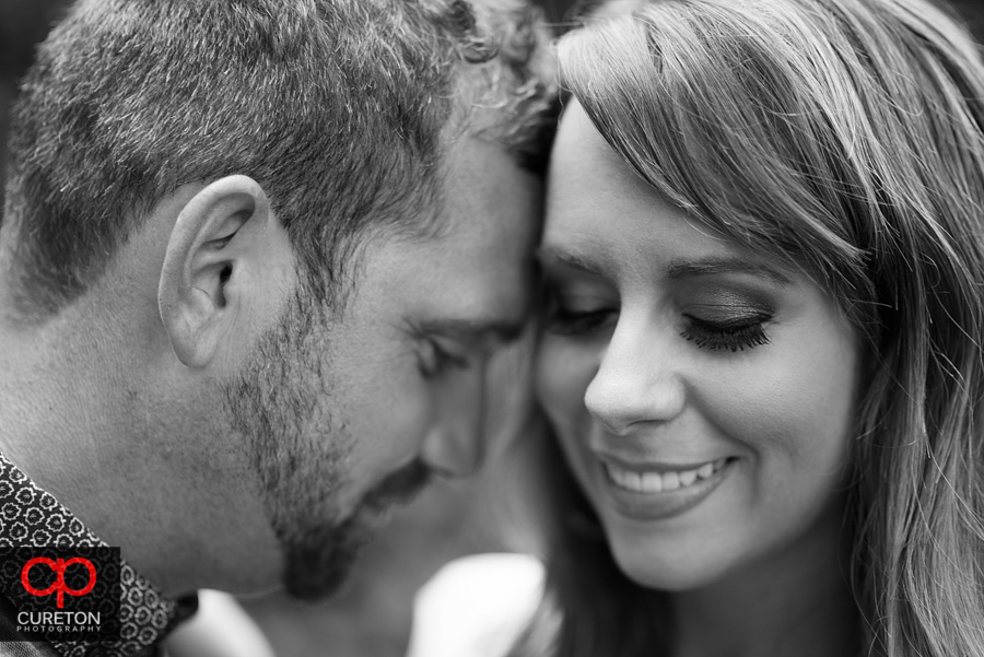 Black and white closeup on an engaged couple.