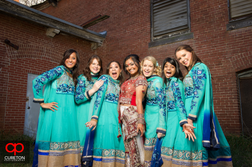 Bride and Bridesmaids in full Indian dresses.